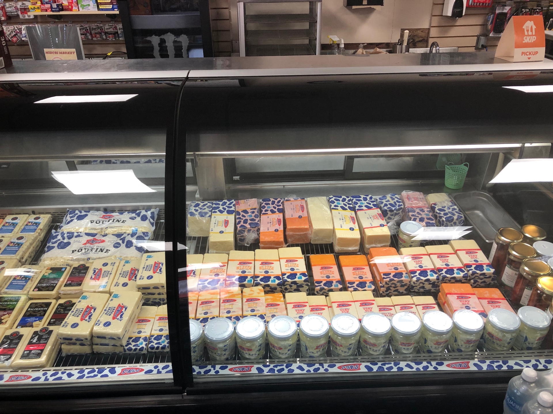 St-Albert cheese and poutine curds deli case